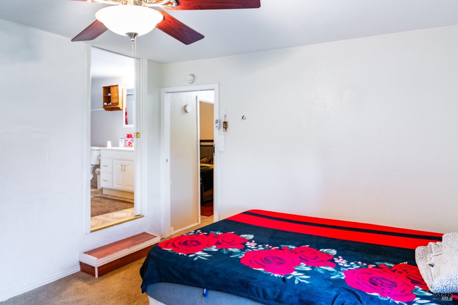 32 Boxelder Court Napa, CA 94558 - Photo 57 of 75 a bedroom with a bed and a dresser