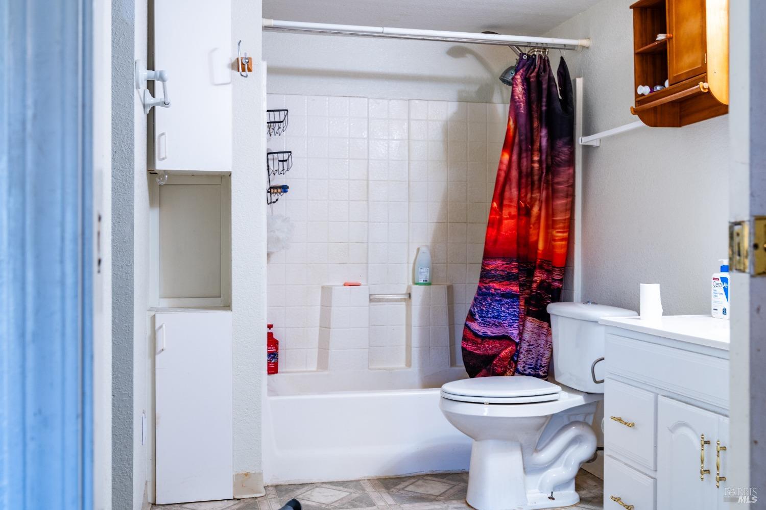 32 Boxelder Court Napa, CA 94558 - Photo 60 of 75 a bathroom with a sink toilet and shower