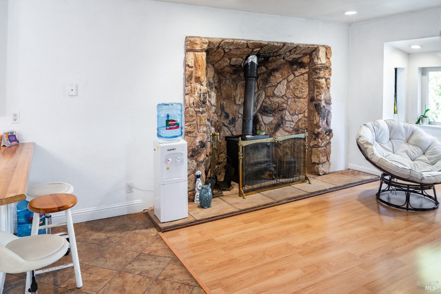 32 Boxelder Court Napa, CA 94558 - Photo 6 of 75 a view of a livingroom with furniture and a fireplace