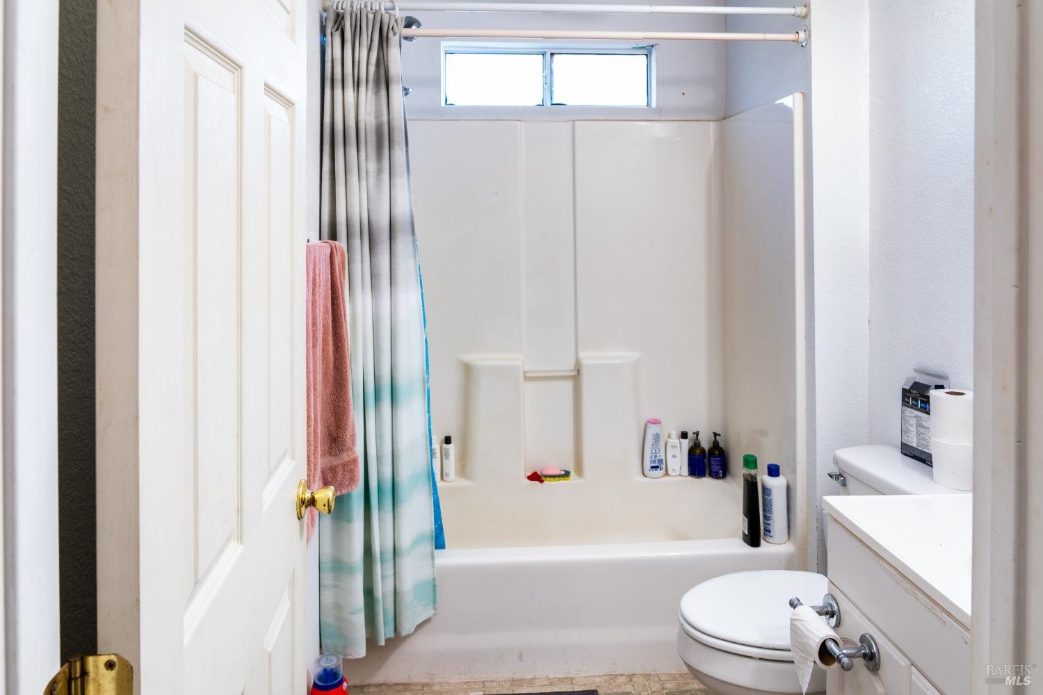32 Boxelder Court Napa, CA 94558 - Photo 63 of 75 a bathroom with a toilet a sink and bathtub