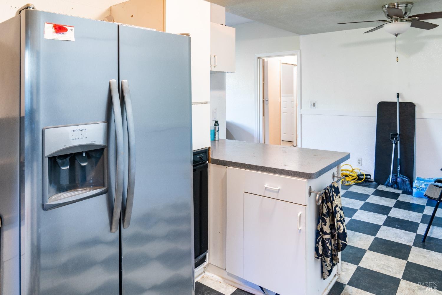 32 Boxelder Court Napa, CA 94558 - Photo 72 of 75 a kitchen with a refrigerator and a sink