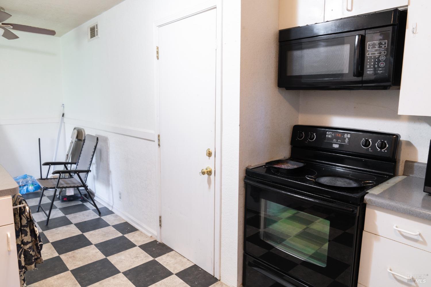 32 Boxelder Court Napa, CA 94558 - Photo 73 of 75 a kitchen with a stove and a microwave