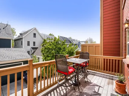 a view of a chairs and table on the terrace