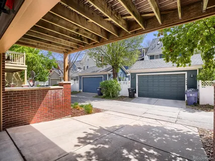a side view of a house with a garage