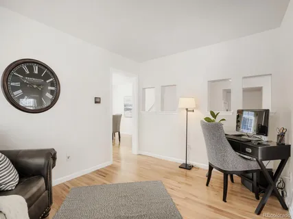 a view of a livingroom with furniture and a couch