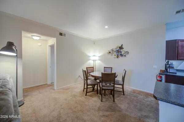 a view of a dining room with furniture