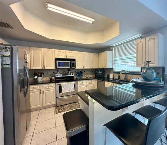 $575,000 | 11964 Southwest 81st Lane, Unit 11964, Miami, FL 33183