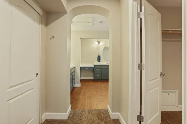 a view of a bathroom from the hallway