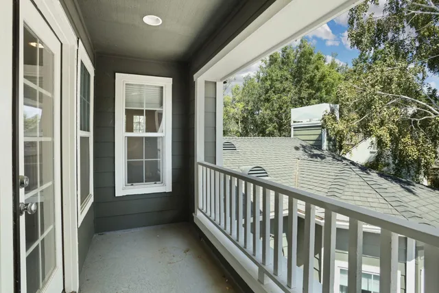 a bedroom with a bed and furniture