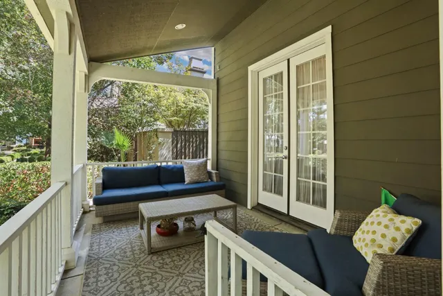 a outdoor living space with furniture and a potted plant