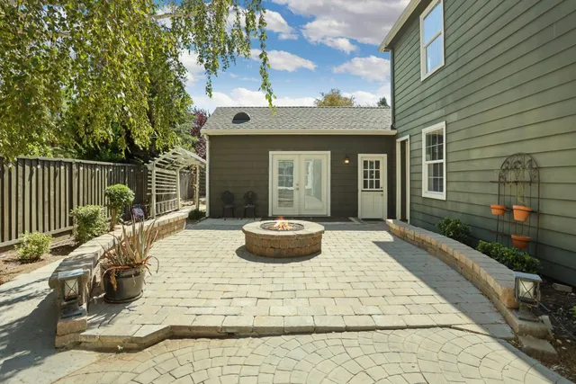 a backyard of a house with seating space