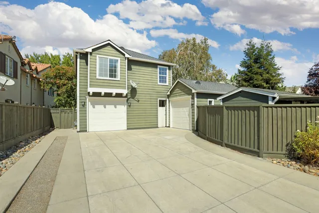 a house with trees in front of it