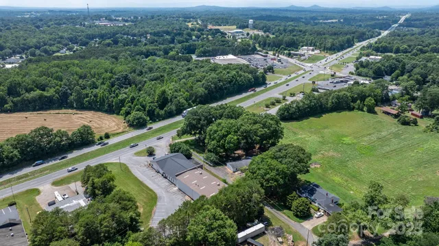a black and white photo of a bench