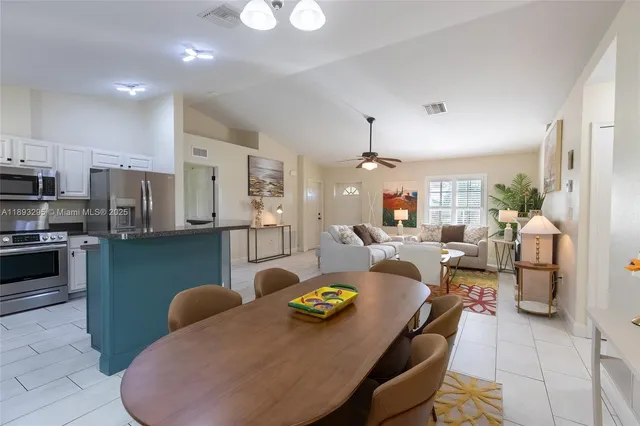 a living room with lots of furniture and appliances