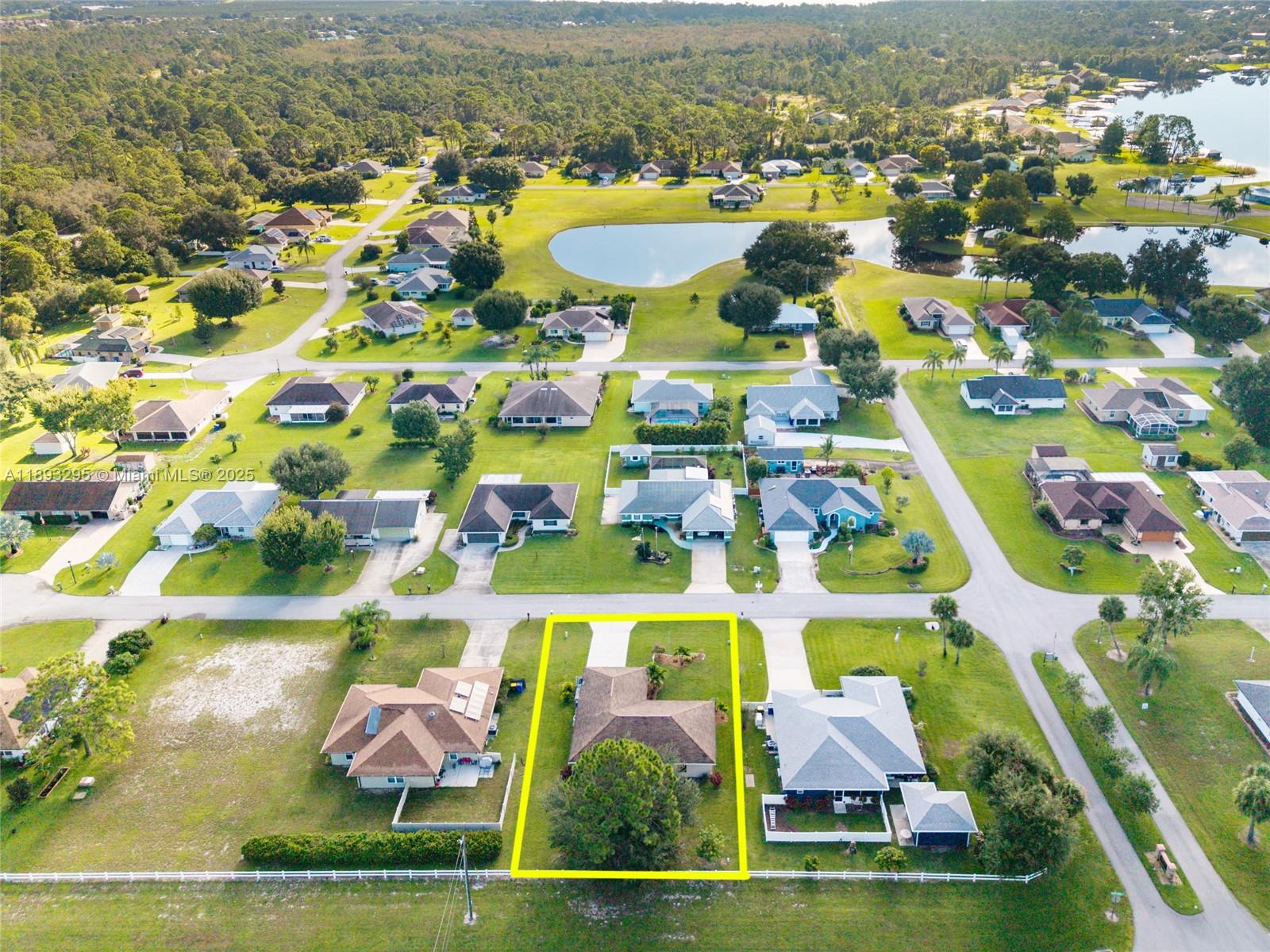 36 Quail Roost Road Lake Placid, FL 33852 - Photo 2 of 48 a aerial view of residential houses with outdoor space