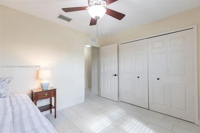 a view of a hallway with front door and furniture