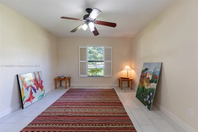 a bedroom with furniture and a chandelier