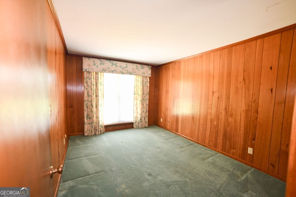 39 Adams Street Jesup, GA 31545 - Photo 31 of 49 a view of an empty room with a window