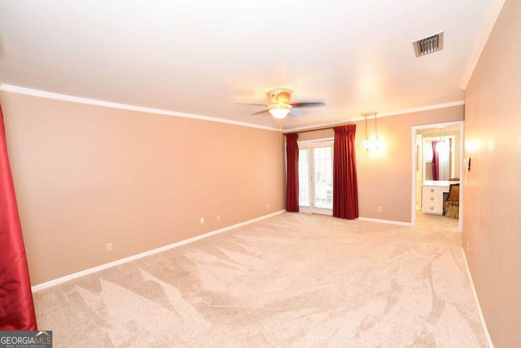 39 Adams Street Jesup, GA 31545 - Photo 33 of 49 a view of an empty room with a window