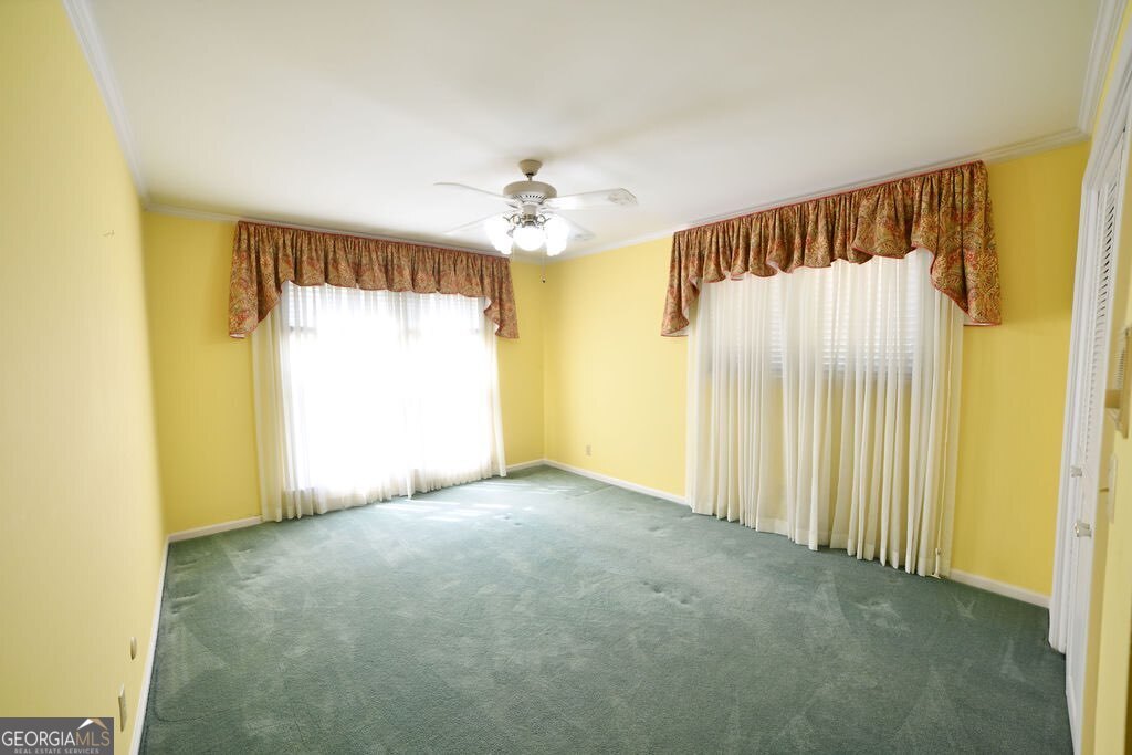 39 Adams Street Jesup, GA 31545 - Photo 35 of 49 a view of an empty room with a window