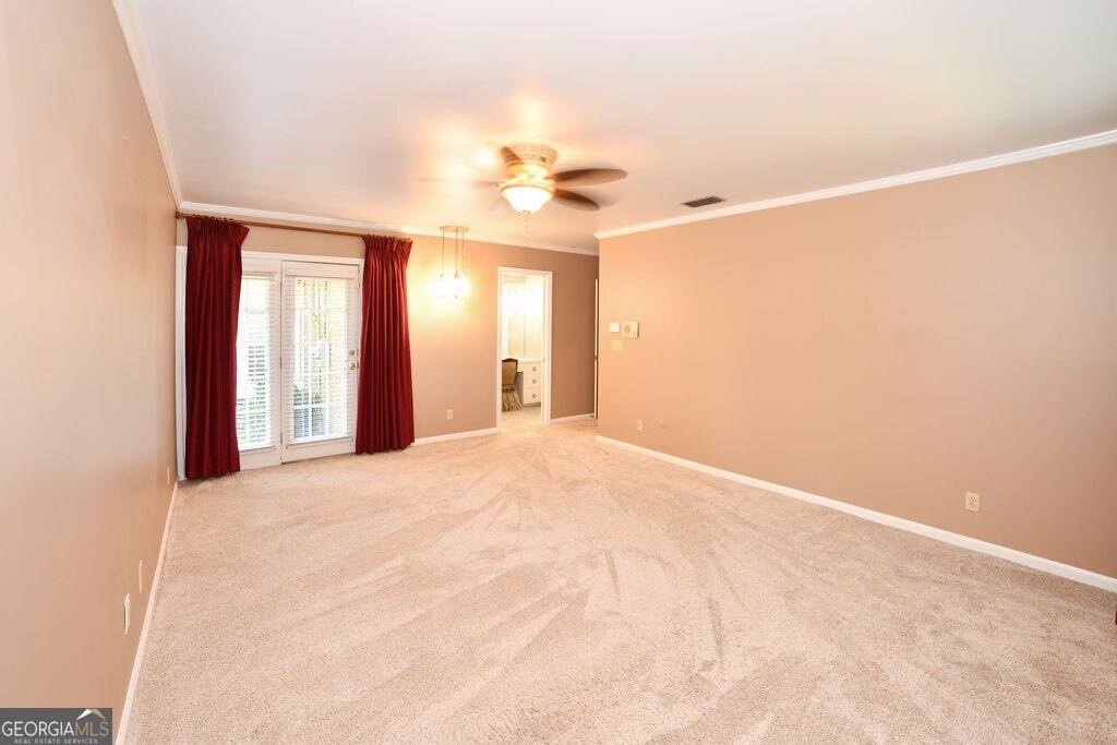 39 Adams Street Jesup, GA 31545 - Photo 36 of 49 a view of an empty room with a window