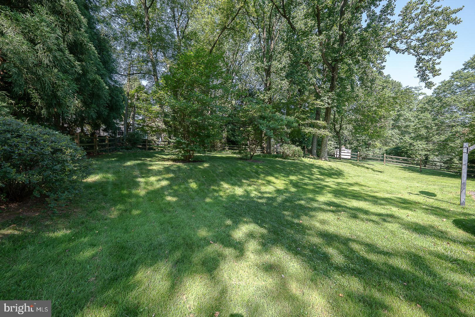 406 Devon State Road Devon, PA 19333 - Photo 10 of 14 a big yard with lots of green space and deers