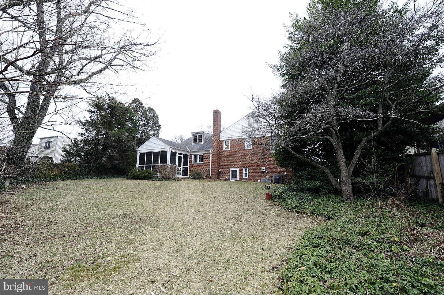 5719 Ogden Road Bethesda, MD 20816 - Photo 2 of 22 a view of a house with a yard