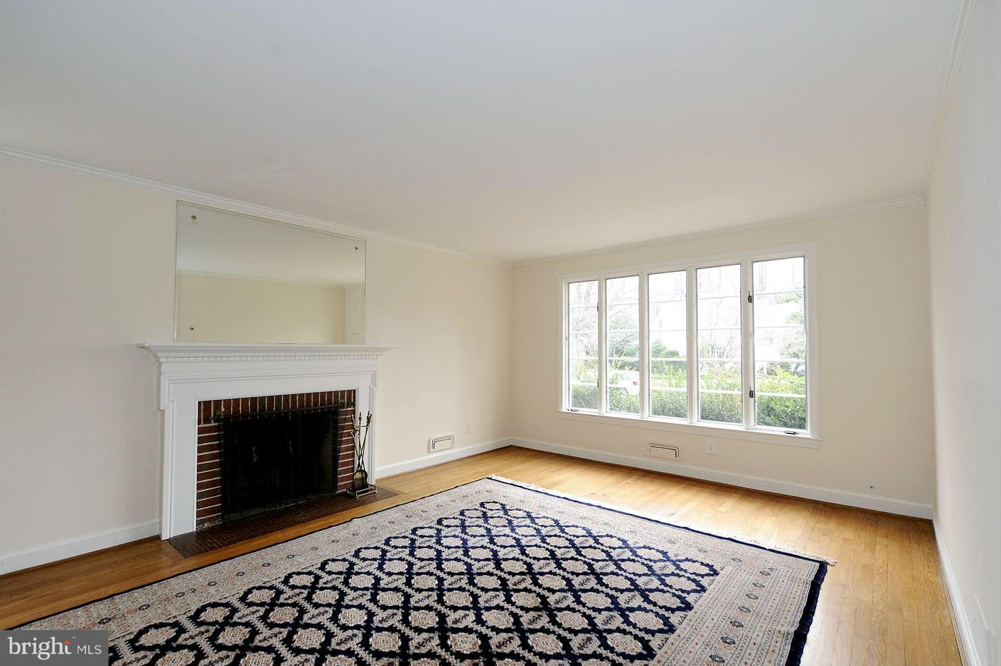 5719 Ogden Road Bethesda, MD 20816 - Photo 5 of 22 an empty room with windows