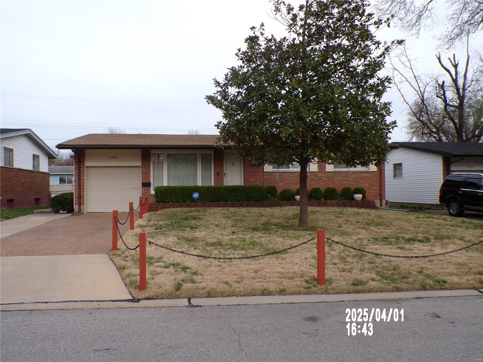 10216 Edgefield Drive St. Louis, MO 63136 - Photo 1 of 14