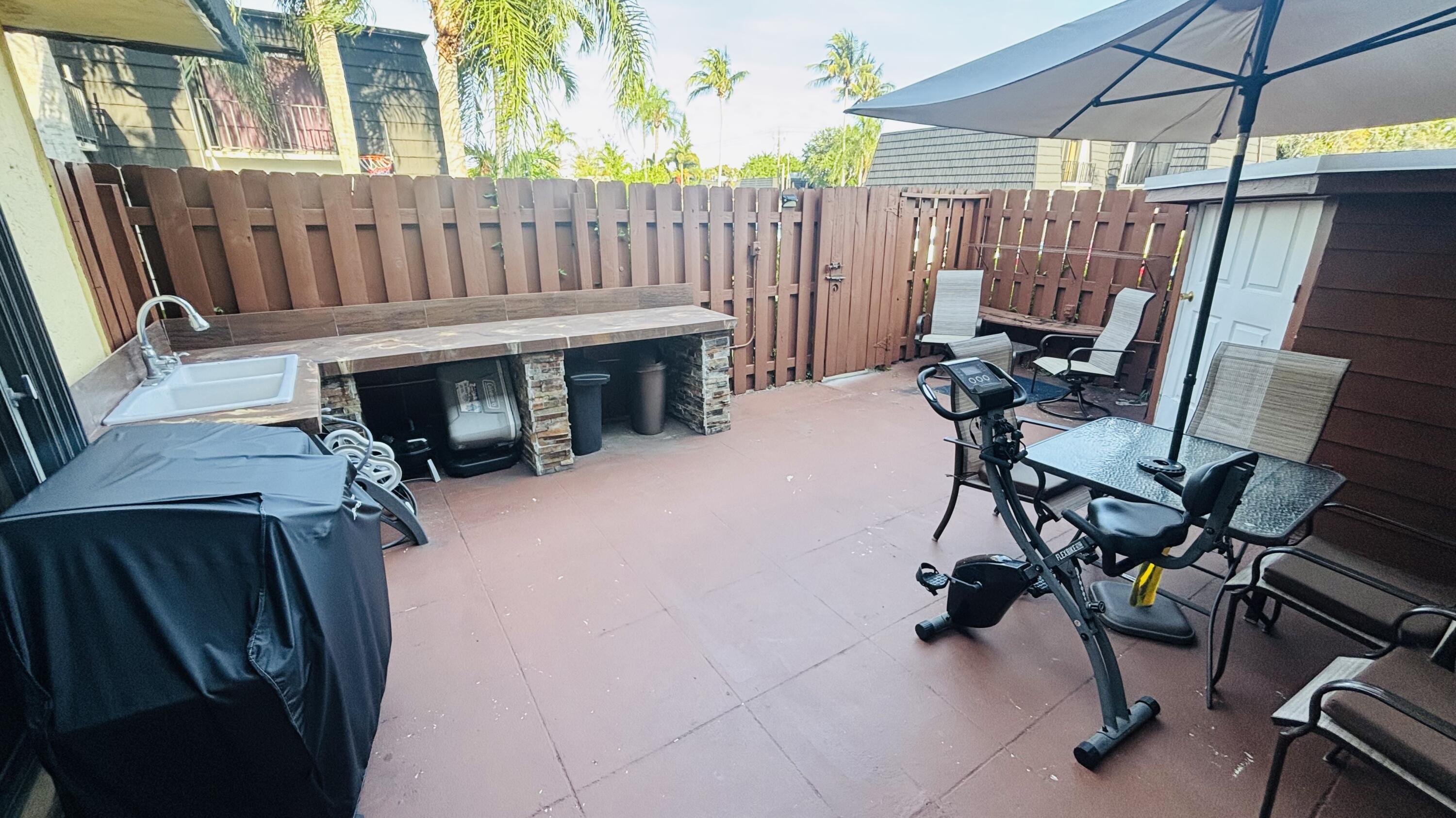 245 Woodland Road Palm Springs, FL 33461 - Photo 12 of 12 Patio 2