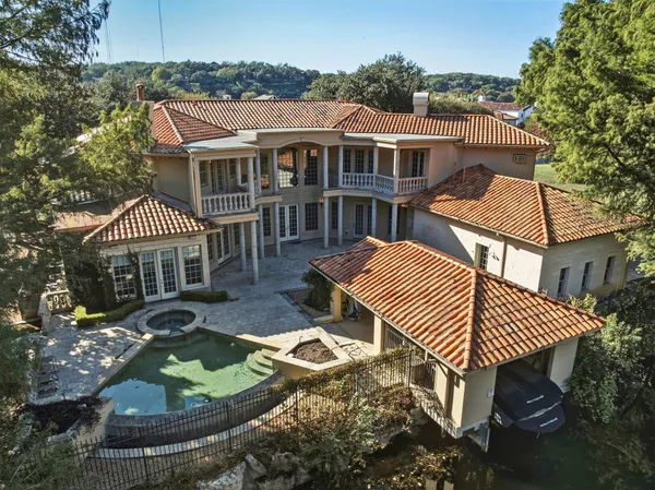 an aerial view of a house having yard