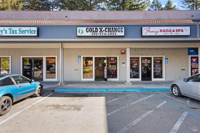 a view of a car park in front of building