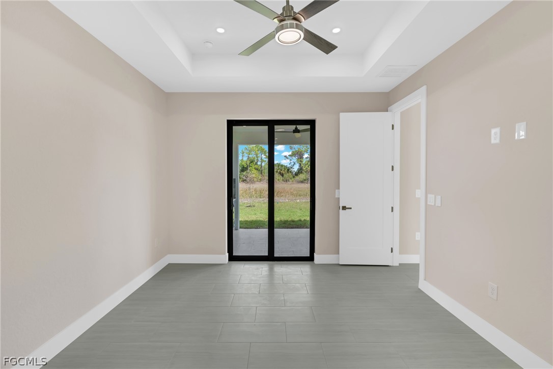 6029 Keystone Circle LaBelle, FL 33935 - Photo 34 of 50 wooden floor in an empty room with a window