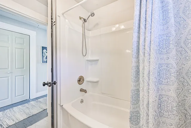 a bathroom with a bathtub