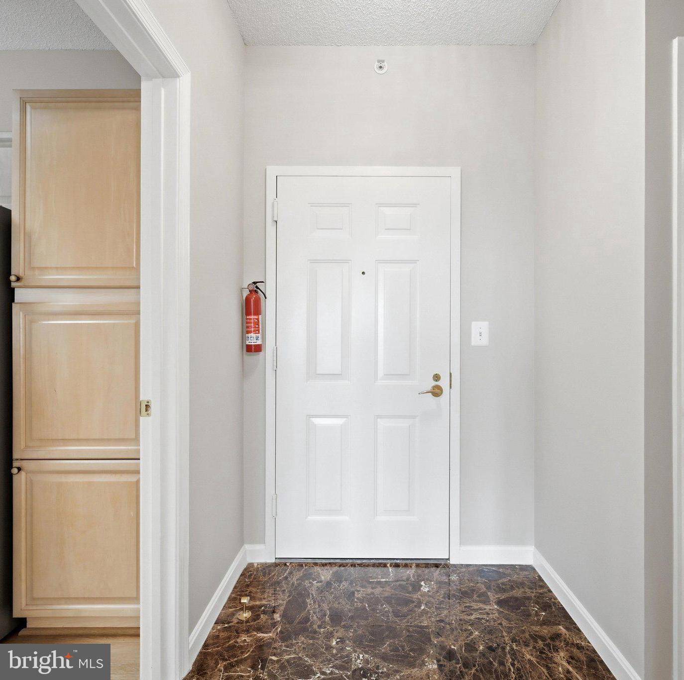 19375 Cypress Ridge Terrace, Unit 922 Leesburg, VA 20176 - Photo 3 of 89 Entry with marble flooring