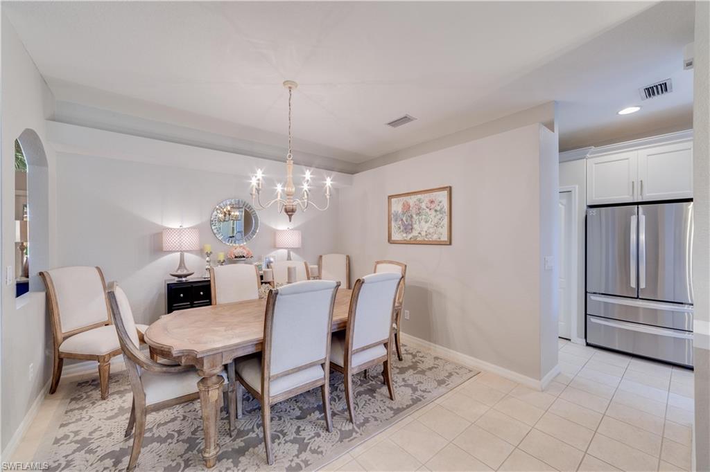 20599 Ardore Lane Estero, FL 33928 - Photo 11 of 34 a view of a dining room with furniture