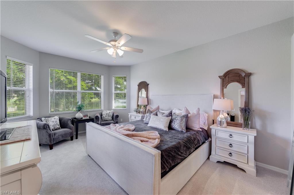 20599 Ardore Lane Estero, FL 33928 - Photo 21 of 34 a living room with furniture and a large window