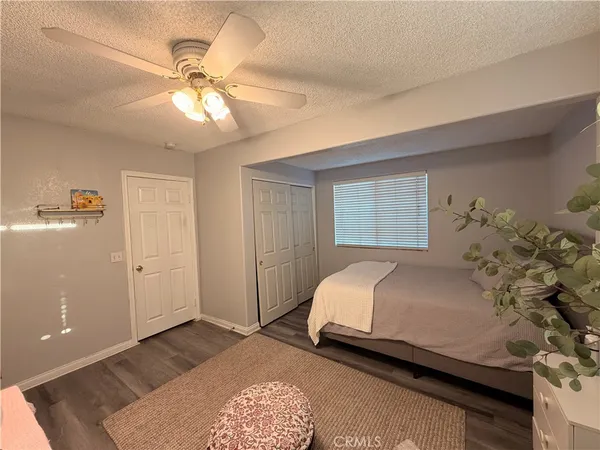 a kitchen with stainless steel appliances granite countertop a refrigerator a stove a sink and a refrigerator