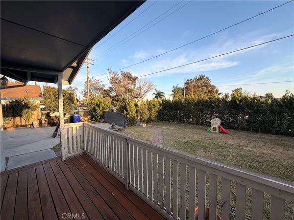 a potted plant sitting in front of a house