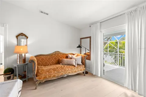 a bathroom with a toilet a sink and curtain