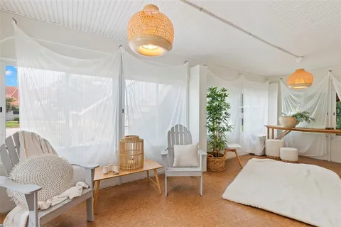 a house view with a garden space