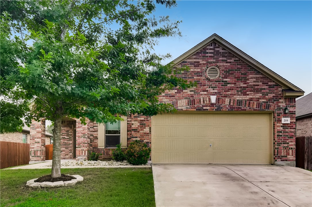 219 Mancos Drive Georgetown, TX 78626 - Photo 1 of 1 a front view of a house with garden