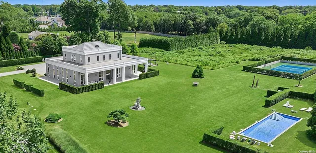 a garden view with a sitting space