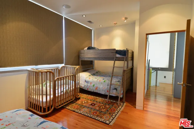 a view of balcony with wooden floor