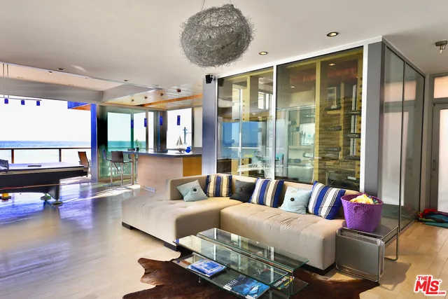 a view of kitchen with furniture and large window