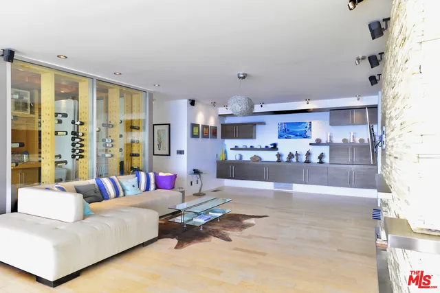 a view of a patio with swimming pool table and chairs