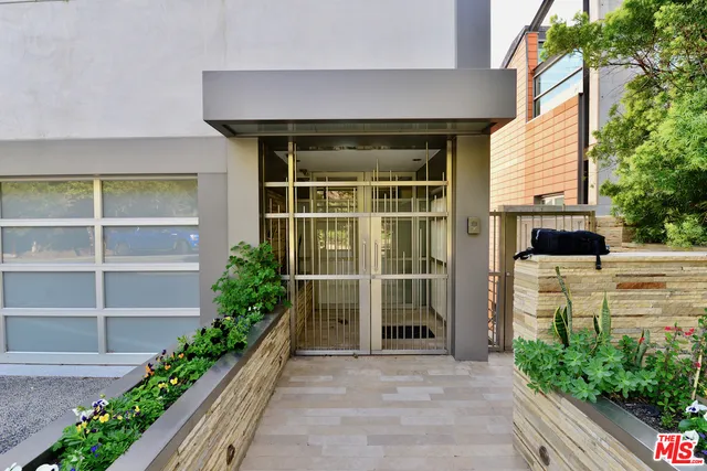 a house view with a garden space
