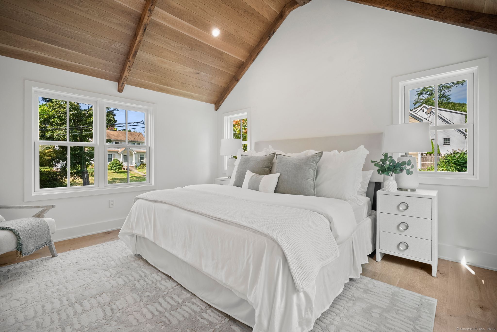 7 Wild Rose Road Westport, CT 06880 - Photo 16 of 33 a bedroom with a bed and a window