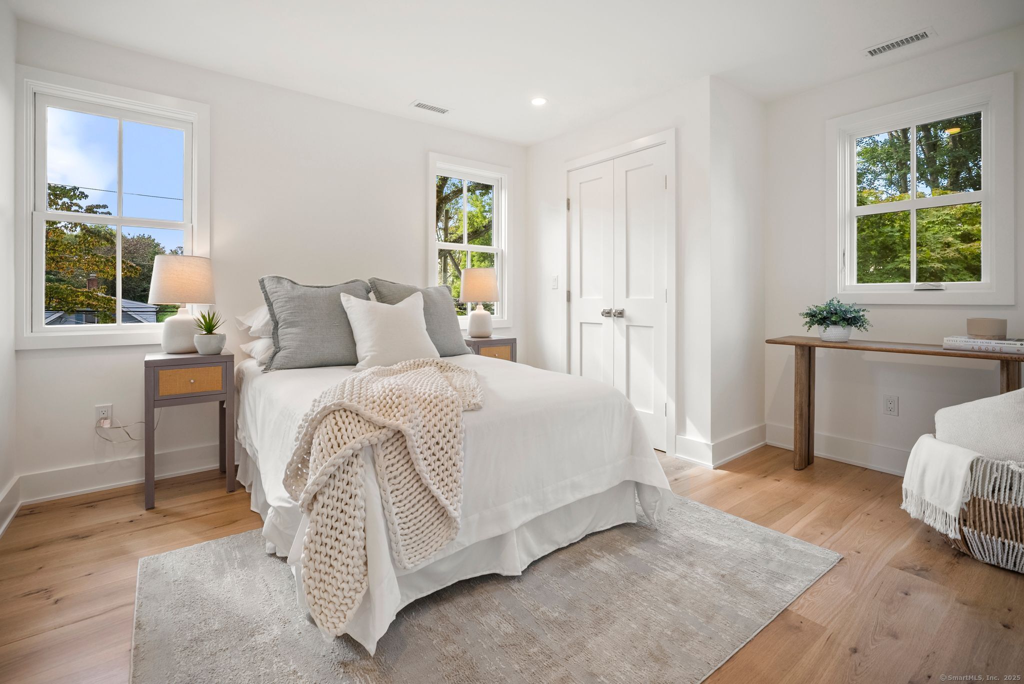 7 Wild Rose Road Westport, CT 06880 - Photo 21 of 33 a spacious bedroom with a bed and a window