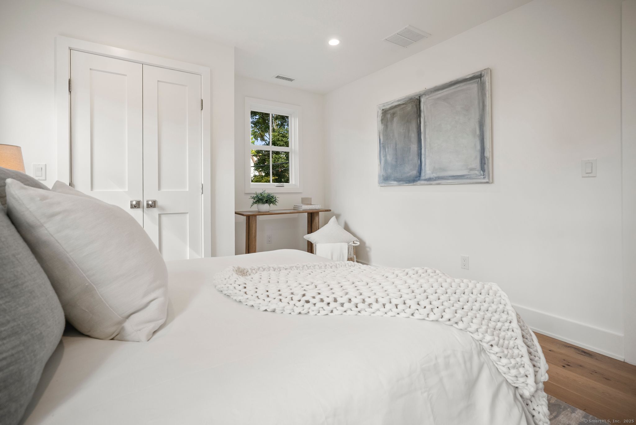 7 Wild Rose Road Westport, CT 06880 - Photo 22 of 33 a bedroom with a bed and a window